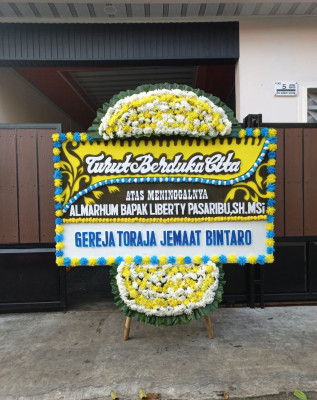 Papan Bunga Duka di Pasar