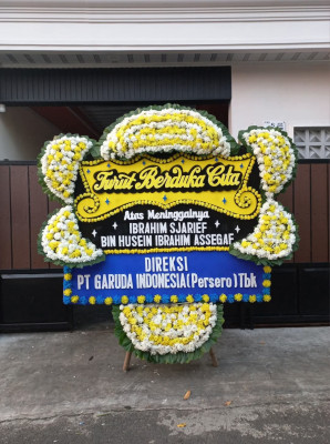 Papan Bunga Duka di Pasar